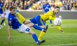 Den Bosch player Nick de Groot (L) and Cambuur player Remco Balk (R) participate in the ga...