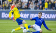 Cambuur player Remco Balk (left) and Den Bosch player Rik Mulders (right) participate in t...