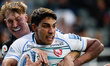 Ben Redshaw of Newcastle Falcons tackles Santi Carreras of Gloucester Rugby during the Gal...