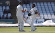 Haseeb Hameed of Nottinghamshire celebrates with Robert Lord after scoring 100 during the...