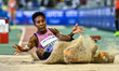 Shanieka Ricketts of Jamaica competes in the women's Triple Jump at the Diamond League Doh...