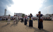Members of Nepal's indigenous Kirat community perform the Shakela dance while celebrating...