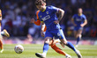 Jake Reeves of AFC Wimbledon passes the ball during the Sky Bet League 2 Play Off Semi Fin...