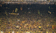 Fans of Borussia Dortmund show support for their team prior to the Bundesliga match betwee...
