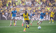 Serhou Guirassy of Borussia Dortmund scores his team's first goal during the Bundesliga ma...