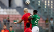 Alessandro Coppola (top, left) of Birkirkara vies for the ball with Franklin Sasere of Flo...