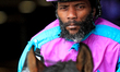 Jockey Juan Crawford rides out of the paddock ahead of the second race at Woodbine Racetra...