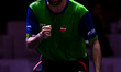 Noshad Alamiyan of Iran competes against Ovidiu Ionescu of Romania during the men's Single...