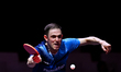 Ovidiu Ionescu of Romania competes against Noshad Alamiyan of Iran during the men's Single...