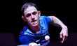 Ovidiu Ionescu of Romania competes against Noshad Alamiyan of Iran during the men's Single...