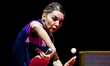 Bernadette Szocs of Romania competes against Wegrzyn Katarzyna of Poland during the women'...