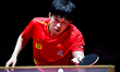 Chuqin Wang of China competes against Nandan Naresh of the United States during the men's...