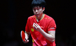 Chuqin Wang of China competes against Nandan Naresh of the United States during the men's...