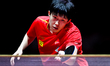 Chuqin Wang of China competes against Nandan Naresh of the United States during the men's...