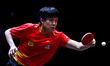 Chuqin Wang of China competes against Nandan Naresh of the United States during the men's...