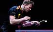 Benedikt Duda of Germany competes against Alberto Mino of Ecuador during the men's Singles...