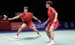 Huang Dongping (right) and Feng Yanzhe (left) of China compete against Wu Mengying and Gao...