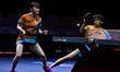 Maharu Yoshimura and Satsuki Odo of Japan compete in the Mixed Doubles Round of 64 match a...