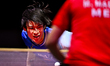 Shunsuke Togami of Japan competes against Marcos Madrid of Mexico during the men's Singles...