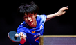 Shunsuke Togami of Japan competes against Marcos Madrid of Mexico during the men's Singles...