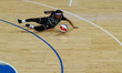 Spice Sidney #6 of the Harlem Globetrotters performs on the court during the Harlem Globet...