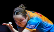 Mima Ito of Japan competes against Wang Yidi of China during the women's singles quarterfi...