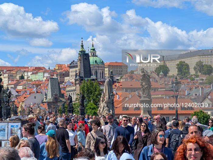 Mass Tourism On Charles Bridge In Prague