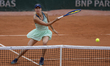 Anna Bondar returns the ball against Laura Siegemund at the Roland Garros Grand Slam Tourn...