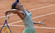 Anna Bondar serves against Laura Siegemund at the Roland Garros Grand Slam Tournament in P...