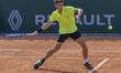 Luca Nardi returns the ball against Fabian Marozsan at the Roland Garros Grand Slam Tourna...