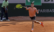 Fabian Marozsan returns the ball against Luca Nardi at the Roland Garros Grand Slam Tourna...