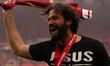Alisson Becker of Liverpool celebrates Liverpool being crowned the Champions of the Premie...