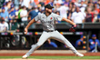 Chicago White Sox starting pitcher Adrian Houser (57) throws during the first inning of a...