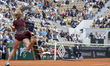 Mirra Andreeva returns the ball against Cristina Bucsa at the Roland Garros Grand Slam Tou...