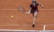 Mirra Andreeva returns the ball against Cristina Bucsa at the Roland Garros Grand Slam Tou...