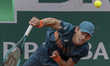 Alex De Minaur serves against Laslo Djere at the Roland Garros Grand Slam Tournament in Pa...