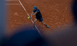 Alex De Minaur returns the ball against Laslo Djere at the Roland Garros Grand Slam Tourna...