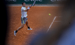 Laslo Djere returns the ball against Alex De Minaur at the Roland Garros Grand Slam Tourna...