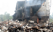 A house is destroyed by a Russian overnight attack on Markhalivka village in the Kyiv regi...