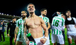 Antony Matheus dos Santos of Real Betis Balompie and his teammates celebrate reaching the...