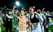 Antony Matheus dos Santos of Real Betis Balompie and his teammates celebrate reaching the...