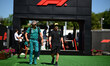 Fernando Alonso of the Aston Martin Cognizant F1 Team walks during free practice of the Sp...