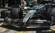 George Russell of the Mercedes AMG F1 Team examines the W16 front wing during the Formula...
