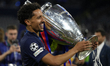 MUNICH, GERMANY - MAY 31: Marquinhos centre-back of PSG and Brazil celebrates with the tro...