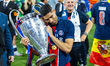 Achraf Hakimi of Paris Saint-Germain celebrates with the trophy after winning the UEFA Cha...