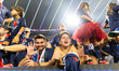PSG supporters celebrate after the UEFA Champions League final football match between Inte...