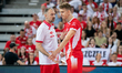 Artur Szalpuk and coach Nikola Grbic talk during the volleyball match between Poland and G...