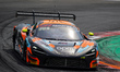 Adam Smalley, Dean MacDonald, and Louis Prette drive the (#58) McLaren 720S GT3 EVO of tea...