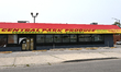 Boarded storefronts, illegal dumping, abandoned apartment buildings, and economic decay do...