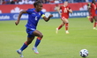 Melchie Dumornay #6 of Haiti drives the ball forward during the Women's International Frie...